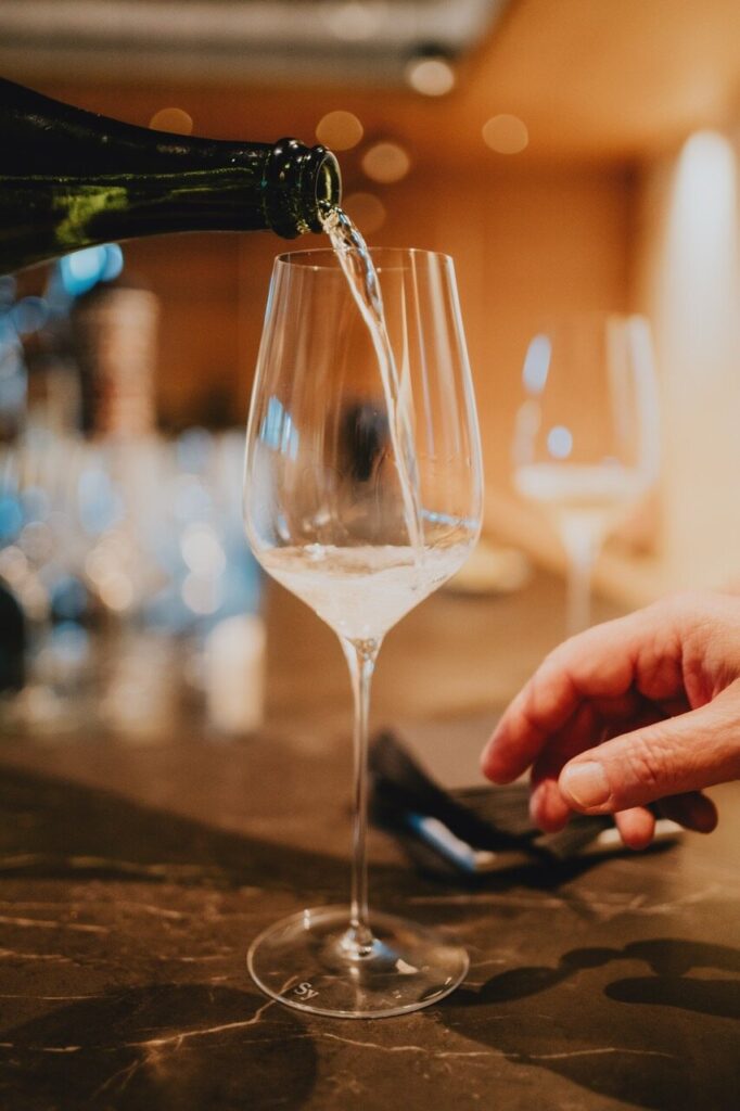 A glass of wine poured at the Casca Wines cellar table